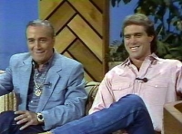Faron Young (left) with John Arnold (right) on television.