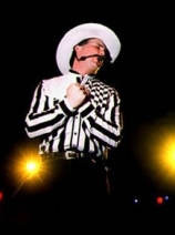 Garth Brooks, singing.